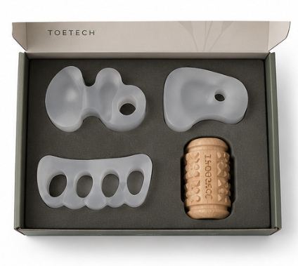 Balance Kit tray showing bunion corrector toe separator pinky corrector and foot roller