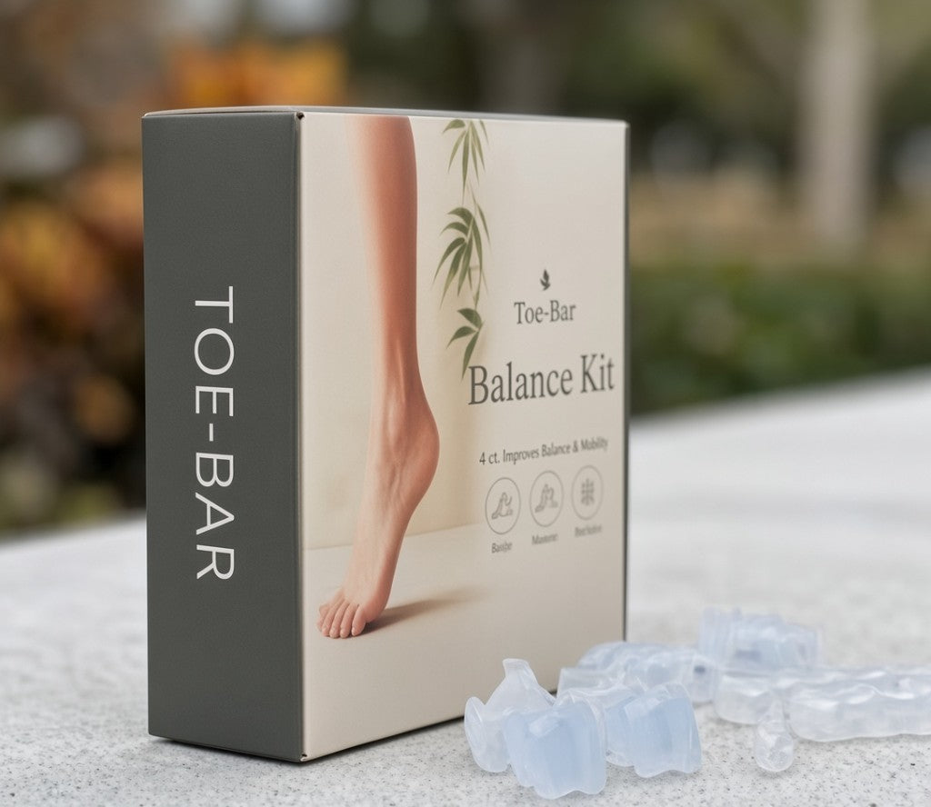 Toe-Bar Balance Kit packaging with foot imagery and silicone toe separators in the foreground