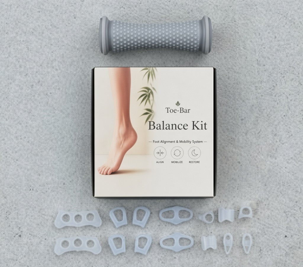 Toe-Bar Balance Kit flat lay with foot roller, box, and full set of silicone toe correctors and separators